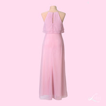 Pink halter-style dress with ruffled top and peep back detail